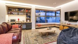 Upstairs lounge with kitchenette and desk 