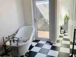 Golden Glen with victorian style bath and out door shower