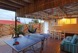 Entertainment deck showing table tennis and al fresco dining 