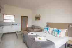 Double Villa Suite - Bedroom and Kitchenette