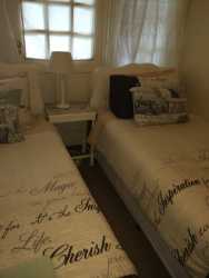 second bedroom with bathroom opposite passage. double bed on request for booking of minimum of  2 days