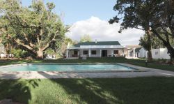 Terrace overlooking large pool.