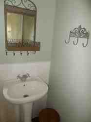 Unusual bathroom features in both bathrooms.