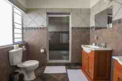 Double Room with Patio - Room 4 - Bathroom with a walk-in Shower
