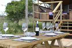 Picnic table on the patio of the tent 