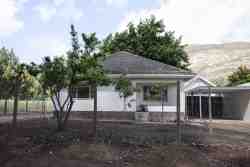 Front view: Main house left / flat right