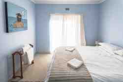 Flat bedroom with en-suite bathroom