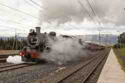 Steam train passing the house