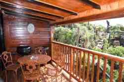 Balcony with weber and skottel braai as well as two lazy chairs to enjoy South African sun