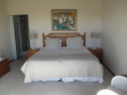 Comfortable upstairs room with large deck to enjoy.