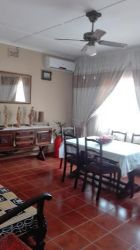 lounge and dinning area in the main guest house to be shared with guest booking sagrens  en suit room 
