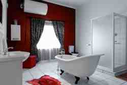 Bathroom with bath and shower