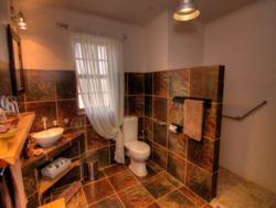 En-suite bathroom with walk-in shower - wheelchair friendly - Ferox Cottage No 2 and Striata Cottage no 4.