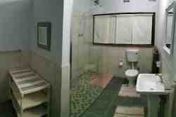 Yellow/Pink Bedroom shared bathroom