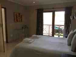 Main bedroom with balcony