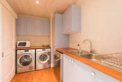 Scullery with washing machine, tumble dryer and dishwasher