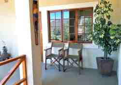 Patio on stoep in front of rooms