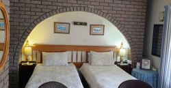 Studio unit set up as two single beds