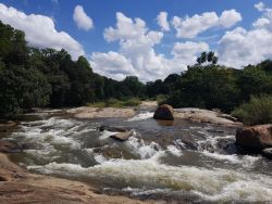 River rapids close to Restaurant, Bar/Lounge and Luxury Tents.