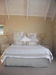 Main house suite There are also 2 single beds and a small study with bath/shower.