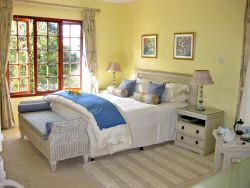Queen Sized Room with mountain views and Separate Lounge.