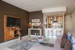 One bedroom apartment lounge and kitchen