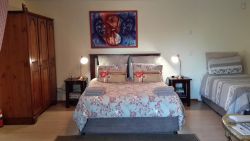 Valley View Room with queen sized bed and single bed