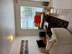 Spacious & comfortable  lounge with small balcony.