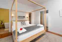 Romantic Suite - Garden room 1 with en-suite bath & shower as well as fireplace in the living area