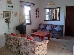 Open plan sitting room with T.V.