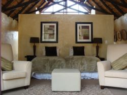 Interior of a double suite set up as twin beds
