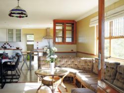 Spacious living area, opening onto front porch