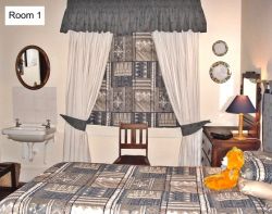 Room 1 - Blue & Grey.  Ideal for a single person who prefers an on-suite bathroom with shower.