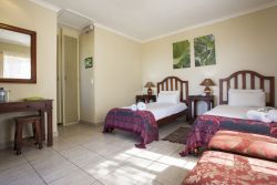 Twin en-suite room with deck out front