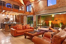 Nooks Pied-a-terre - Lounge opens fully onto courtyard and pool.
