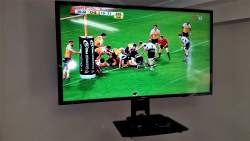 Wall-mounted LED Television + DSTV Decoder