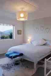 Main Bedroom- long distant sea view and garden