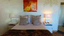 Seabreeze unit main bedroom with queen bed.