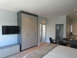 Studio C8: Smart TV and Wardrobe