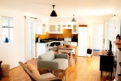 Die Opstal Studio apartment, sleeping one couple, or two persons,open plan kitchen area, leading directly to the pool and front braai area