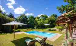Relax on the sun lounger with a glass of wine and a book. 