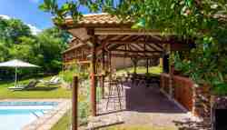 Enjoy a barbeque overlooking the swimming pool and gardens