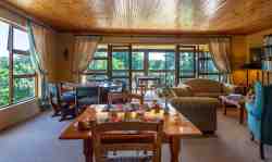 Communal lounge and dining room area where breakfast is served