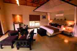 Elephant Lodge:Each spacious air-conditioned unit has high thatched ceilings and a huge, built-in king-size bed, as well as large sliding doors that open onto a private deck with double recliners.