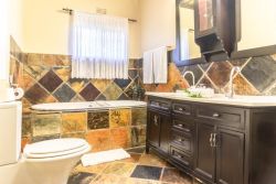 Re a Lora Lodge Bathroom with Bath and Shower