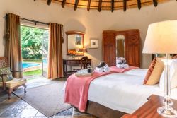 Re a Lora Lodge Bedroom set-up with Kingsize Bed