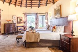 En-suite bedroom with garden view