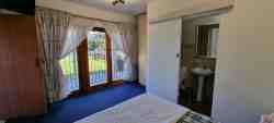 Cottage 2 - main bedroom with double bed & en-suite bathroom , another bathroom for the apartment 