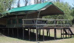Tented Chalets - TENTED CHALETS – Springbok (Unit 1), Impala (Unit 2), Waterbuck (Unit 4) and Sable (Unit 5)
Savannah has 4 Tented Chalets.  Each Tented Chalet has an en-suite bathroom with a shower, toilet and basin.  There is a King Size Bed OR 2 single beds.  An additional bed can be added for children or a 3rd guest.  Our Tents are built on a solid structure raised off the ground. This gives you a great view of the African Bushveld and the Vredefort Dome.  
Each Tent has its own deck with comfortable chairs and a table to enjoy a cold sundowner from our fully licenced bar. All units are equipped with a coffee/tea station and electric blankets.  It includes all bedding, towels and amenities. 
All room rates include breakfast.  Menu’s for lunch and dinner available.  
SELF-CATERING OPTIONS - Braai areas are available.  You are more than welcome to bring your own braai meat, charcoal, fire lighters and salads.  We will keep your food cold in our fridges.  Cutlery and Crockery will be provided.  No Alcohol allowed onto the premises.
