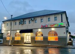 The building after rare rain in the Karoo